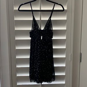 Indah star print  dress with cut outs . XS